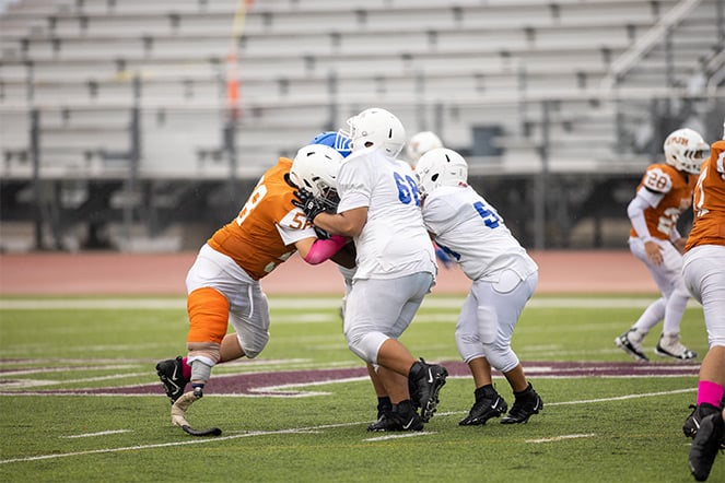 Adison playing football
