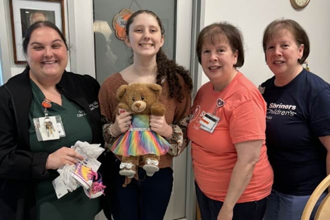 orthopedic patient Alysa with three female providers