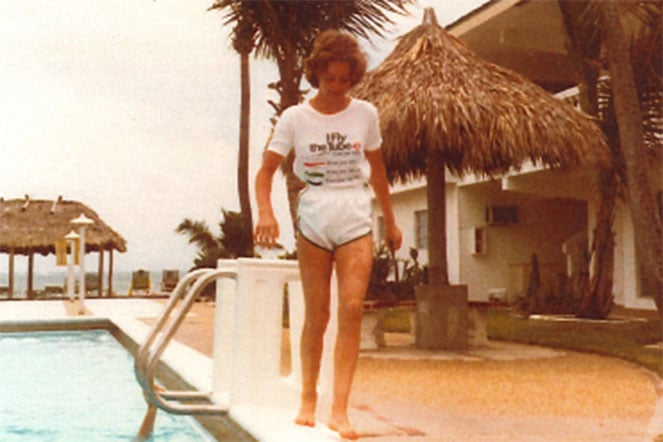 Amy walking around pool after burns