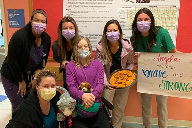 Angela with the rehab team