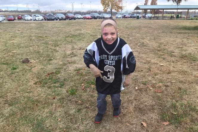 Bryson wearing sports jersey on field
