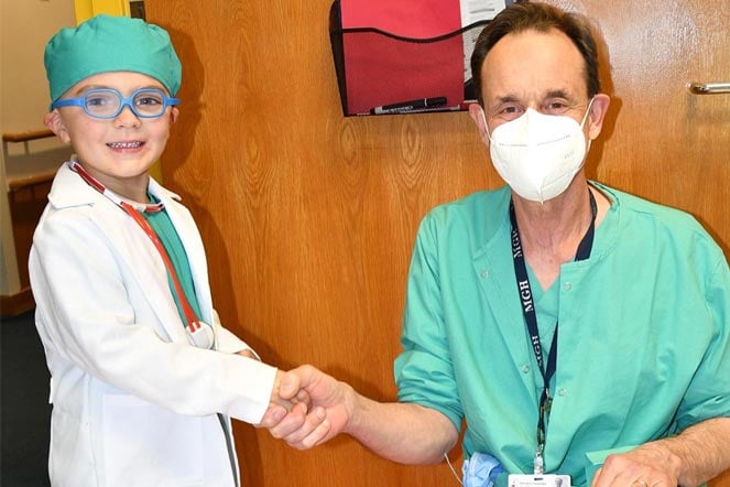 Camden and Dr. Sheridan Shaking Hands