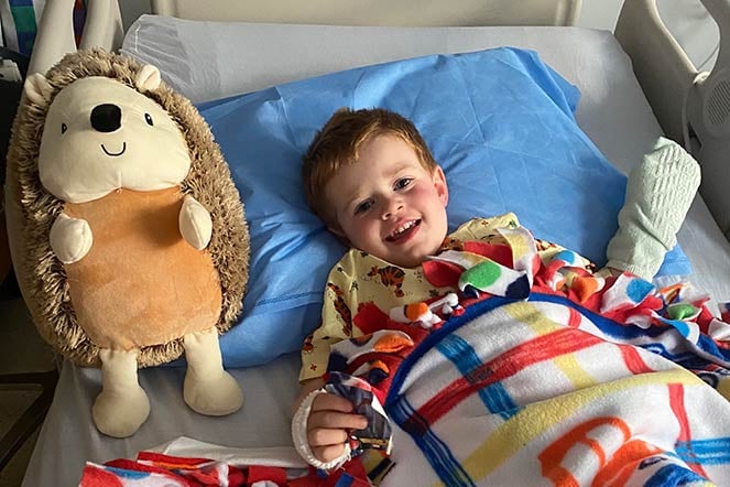 Cameron in hospital bed