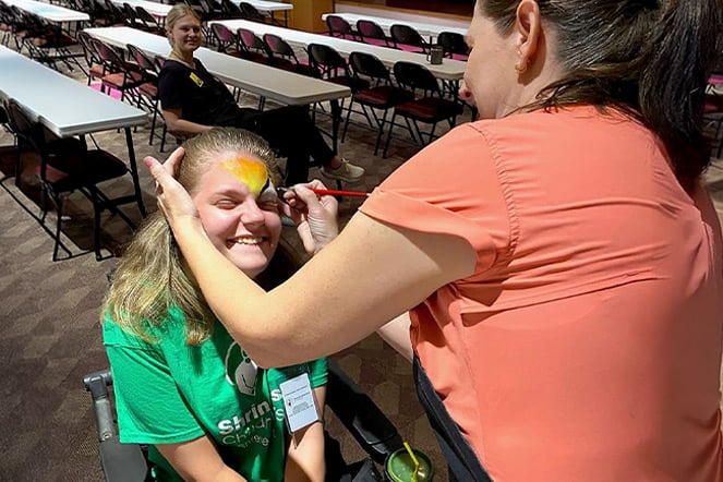 Cerebral Palsy patient having their face painted