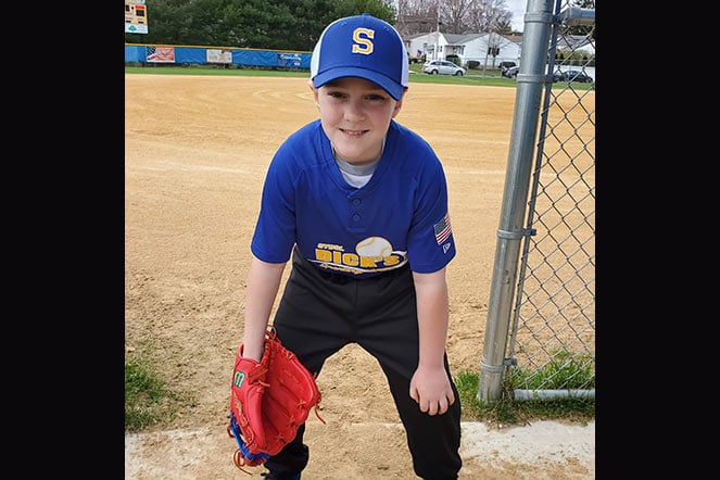 Charlie on the field, ready to play ball