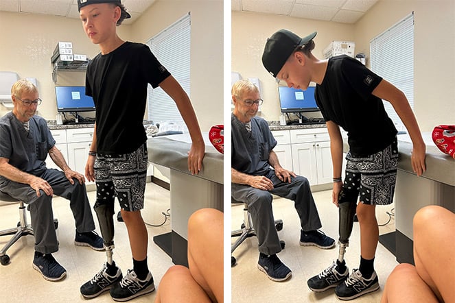 Danny with patient Zavi as he tries on his new prosthetic leg.