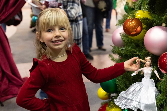 Elly decorating Christmas tree