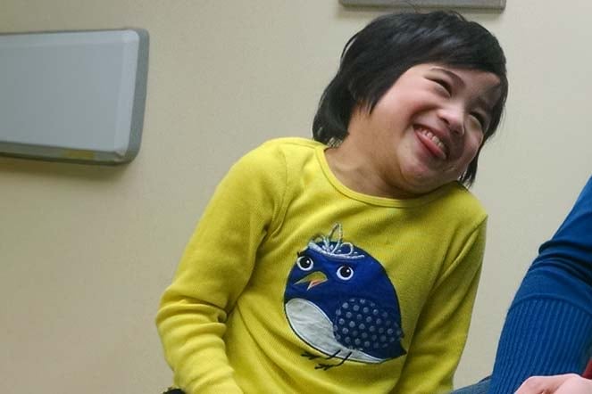 cerebral palsy patient Erica as a child, laughing