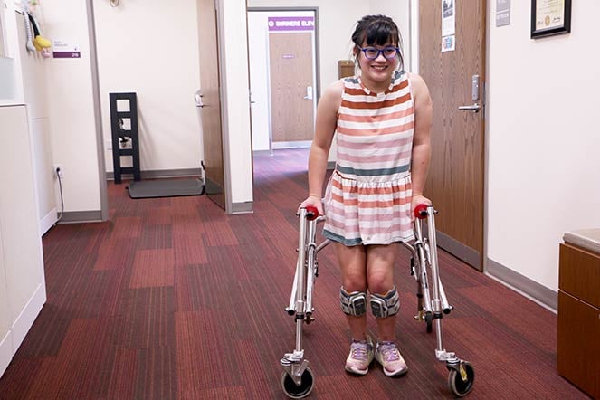 cerebral palsy patient Erica using walker