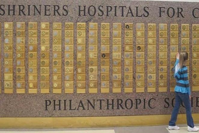 hannea in front of the philanthropic wall