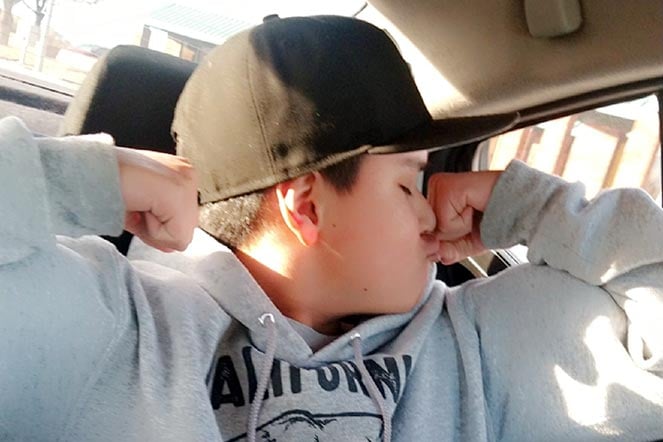 Isaac flexing muscles