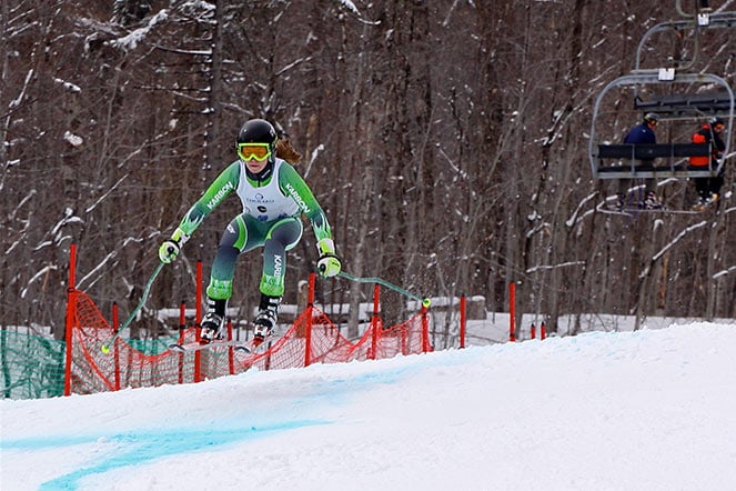 Jackie on  a skiing jump