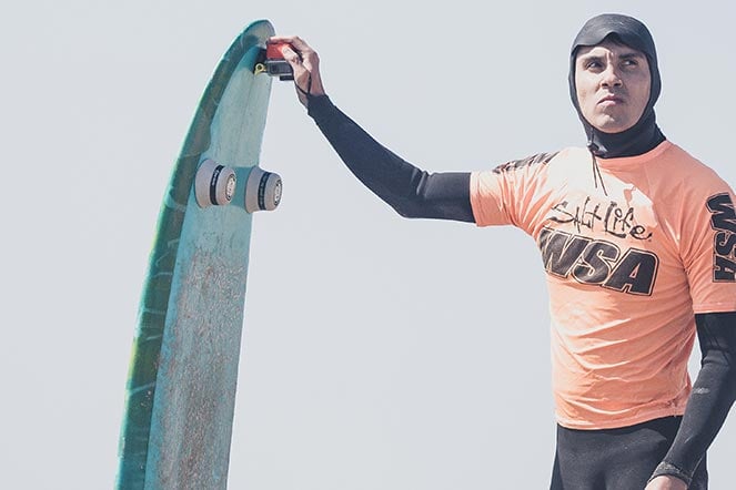 Jacob holding surfboard