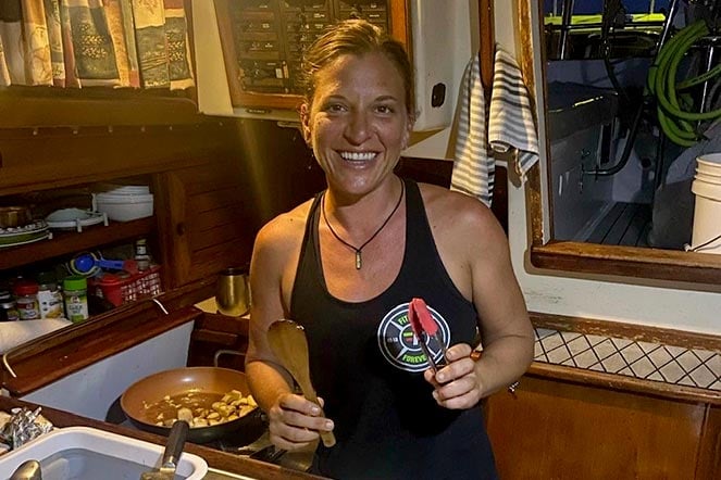Jenny cooking in galley