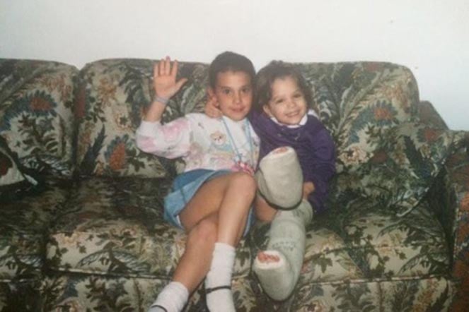 sister and Jenny, wearing casts on legs