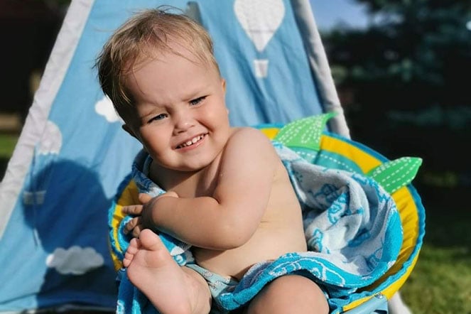 Jokubas outside in chair