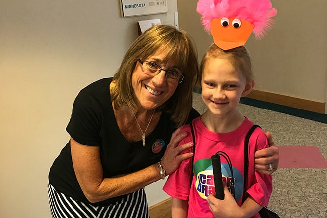 Jordan with female staff member