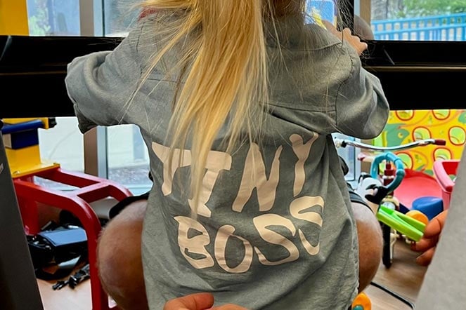 Kennedy's shirt: "Tiny Boss"
