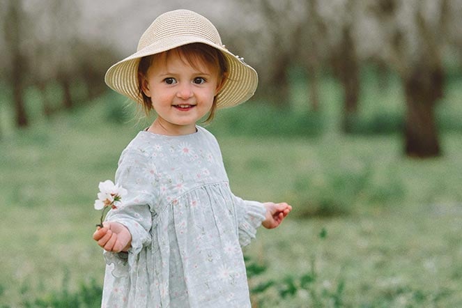 Lina in almond orchard