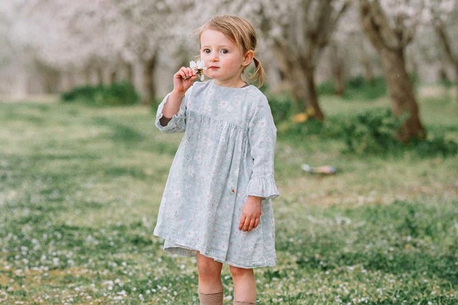 Lina in almond orchard