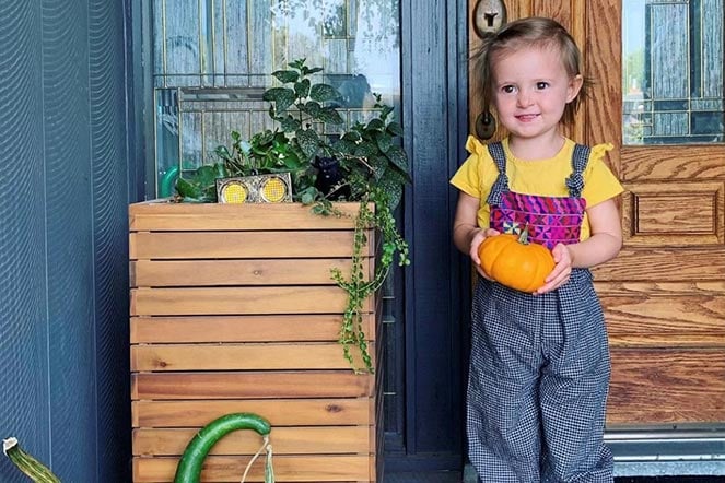 Lina holding pumpkin