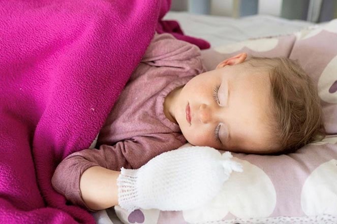 Lina sleeping with bandage on hand