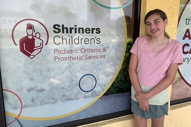 female scoliosis patient outside POPS Tampa