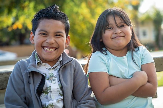 Manny and his sister.