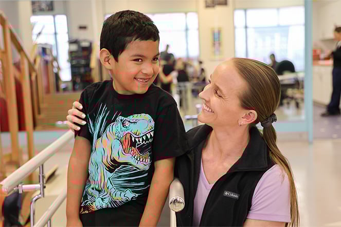 Manny with his physical therapist.