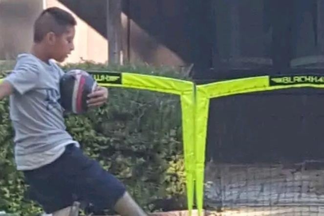 manuel kicking the ball outside