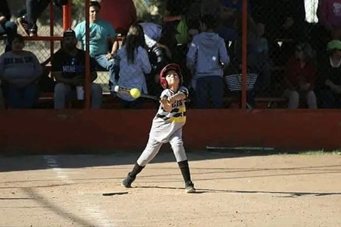 manuel playing softball