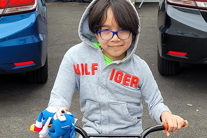 Myles on his bicycle