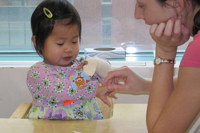 A very young Natalie in therapy