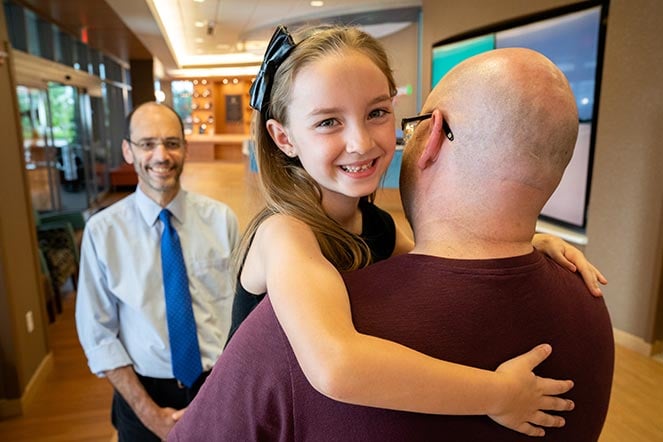owyn with her dad and dr. goldfarb