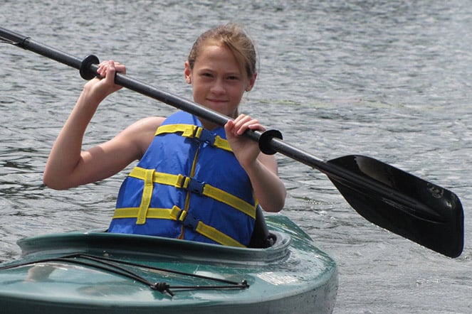 Patient Elena in a kayak