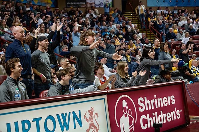 Patient Ambassadors cheering at the Charleston Classic