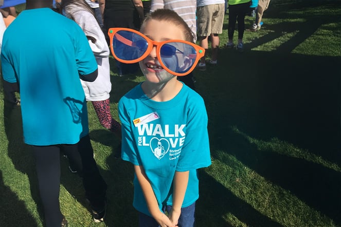 Patient Daniel wearing oversized sunglasses.