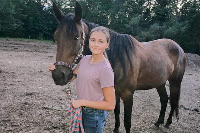 Patient standing with horse