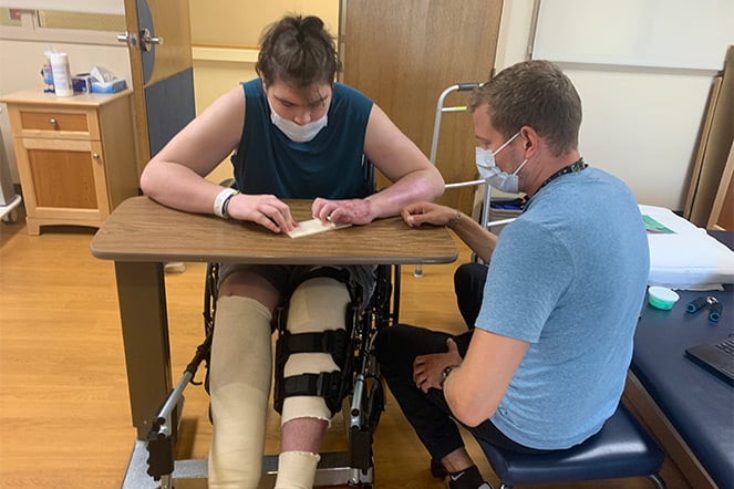 Patient working with occupational therapist