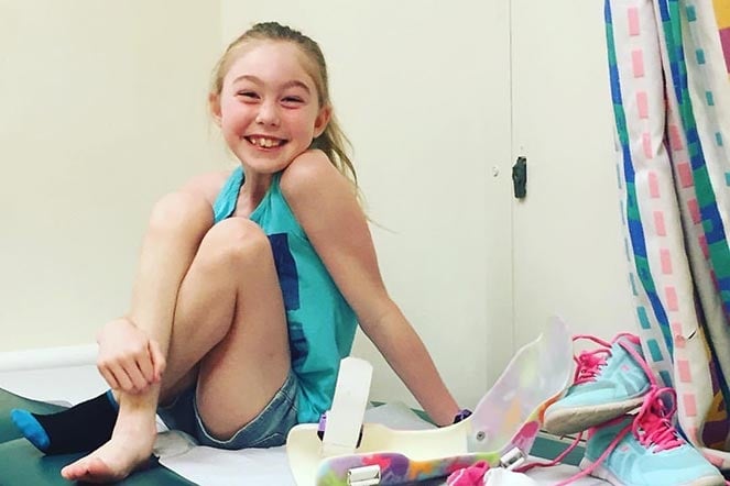 Payton with braces in POPS department