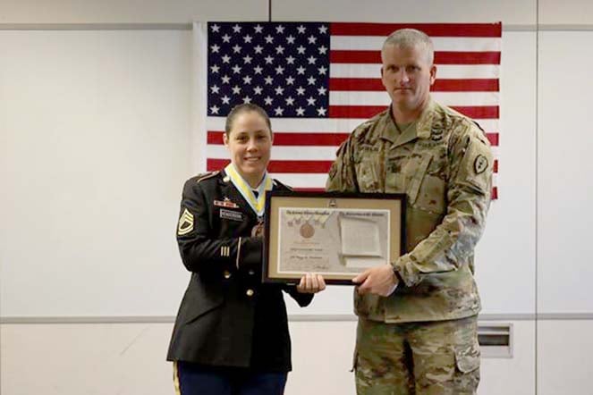 Peggy with colleague during retirement ceremony