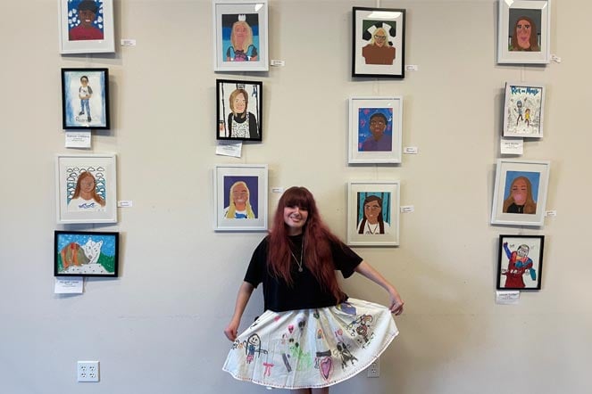 arthrogryposis patient Sadie with artwork