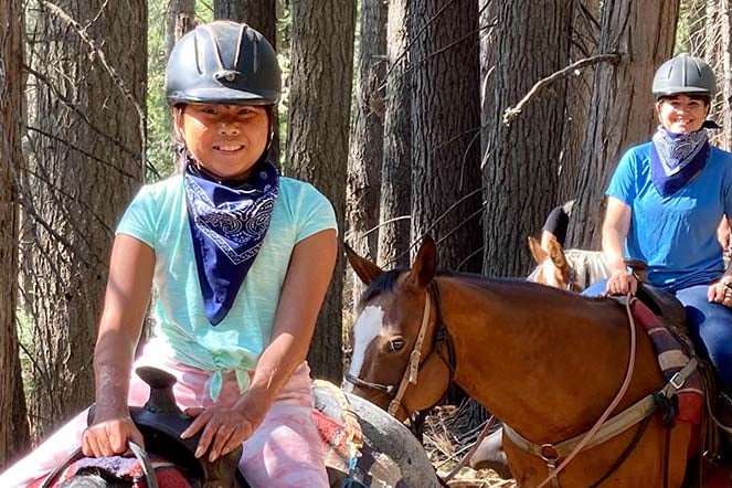 Sarah and mom on horseback