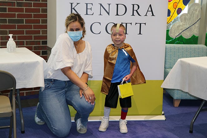 Snyders with staff member