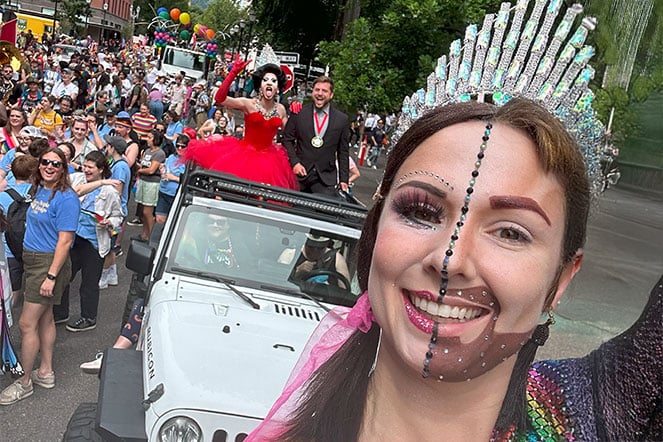 a costumed performer leading a parade