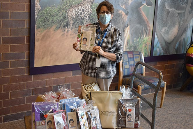 staff member with donations