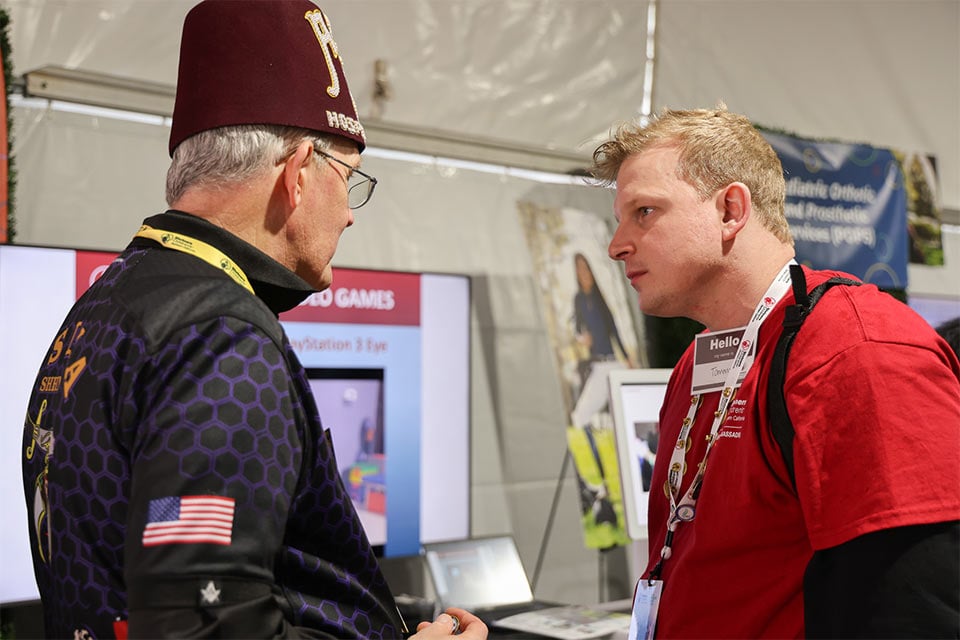 Tommy speaking with a Shriner