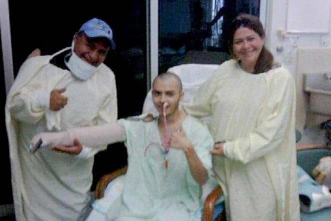 two providers with burn patient Juan Uriel in hospital