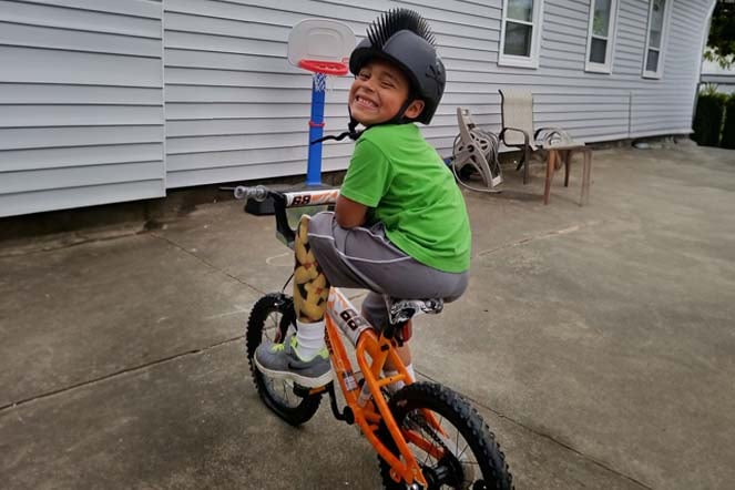 orthopedic patient Carlos riding bike