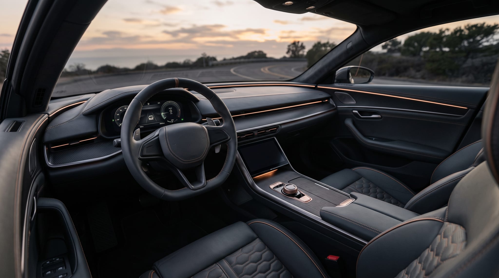 VELARO Aero interior — charcoal and bronze cockpit with ambient light strip